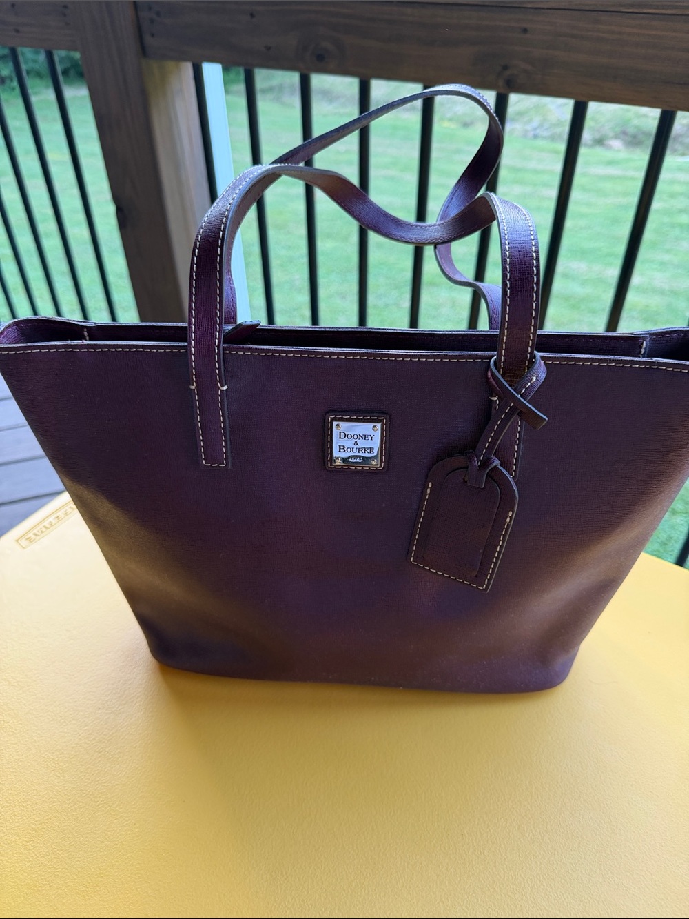 Dooney & Bourke Plum Leather Tote in Deep Purple Burgundy in color